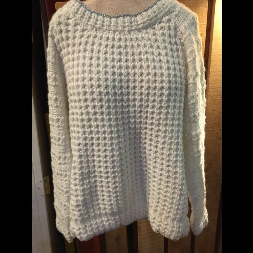 NWT. Beautiful sweater with silver lurex touches!